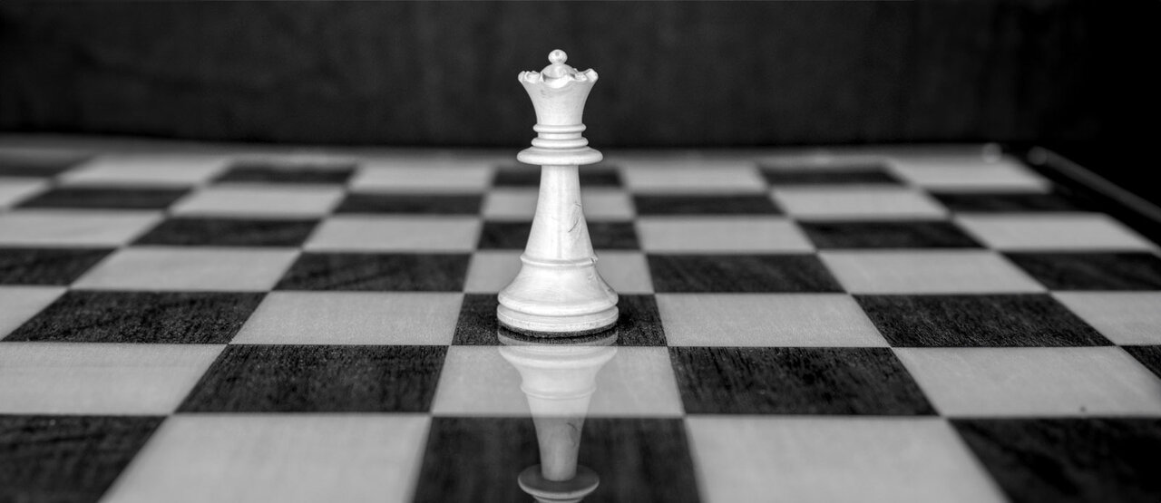 White queen on a chessboard