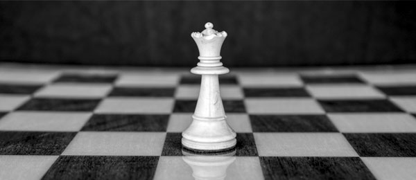 White queen on chessboard